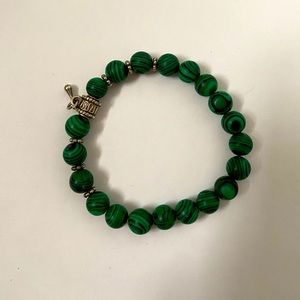 Cool bracelet with prayer wheels!